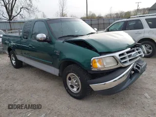 1999 Ford F-150 with VIN 1FTRX17W6XNB96123, listed as a IAAI auction lot 41943786 with 156,047 mi miles and . Bid and sale history available at DreamBid. Image 1.