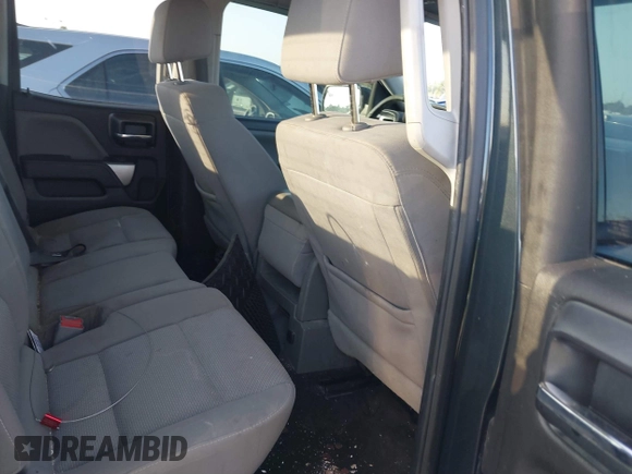 2018 Chevrolet Silverado 1500 LT with VIN 1GCRCREC9JZ105218, listed as a IAAI auction lot 40778682 with 124,621 mi miles and . Bid and sale history available at DreamBid. Image 8.