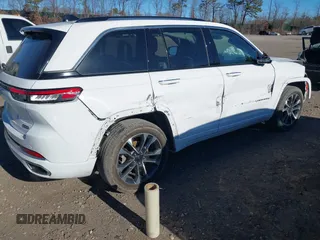 2023 Jeep Grand Cherokee Overland with VIN 1C4RJHDG3PC508742, listed as a IAAI auction lot 41250518 with 23,035 mi miles and . Bid and sale history available at DreamBid. Image 4.