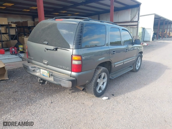 2002 Chevrolet Tahoe LT with VIN 1GNEC13Z92R273473, listed as a IAAI auction lot 41841071 with 290,007 mi miles. Bid and sale history available at carsss.com. Image 4.