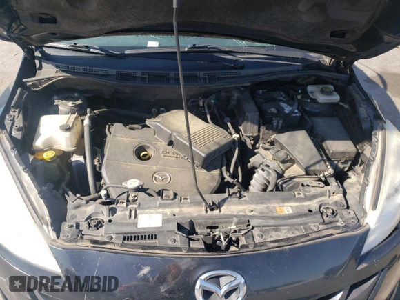2012 Mazda 5 Touring z VIN JM1CW2CL9C0107789, wystawiony jako Copart lot #54526465 z przebiegiem 161 377 mil mil oraz Szkoda całkowita • Salvage title. Historia ofert i sprzedaży dostępna na DreamBid. Obrazek 12.
