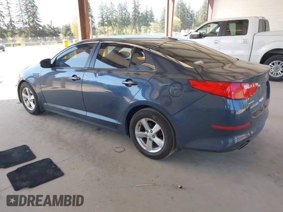 2015 Kia Optima LX with VIN KNAGM4A70F5592109, listed as a IAAI auction lot 42053533 with 159,401 mi miles. Bid and sale history available at carsss.com. Image 3.