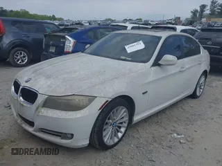 2011 BMW 3 Series 335i with VIN WBAPM5C51BE575704, listed as a IAAI auction lot 42005354 with 205,263 mi miles. Bid and sale history available at carsss.com. Image 17.