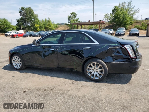 2015 Cadillac CTS Luxury RWD with VIN 1G6AR5SX2F0115311, listed as a Copart auction lot 58944915 with 34,764 mi miles and Salvage title. Bid and sale history available at DreamBid. Image 2.