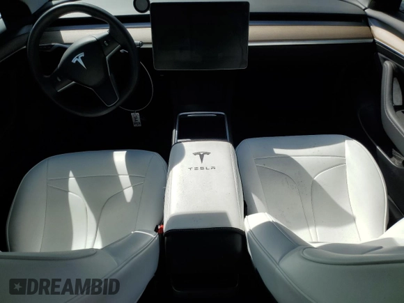 2023 Tesla Model 3 with VIN 5YJ3E1EA8PF648073, listed as a Copart auction lot 49284775 with 20,498 mi miles and Salvage Title. Bid and sale history available at DreamBid. Image 8.
