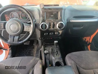 2013 Jeep Wrangler Unlimited Rubicon with VIN 1C4BJWFG7DL525994, listed as a Copart auction lot 46949855 with 179,499 mi miles and Salvage Title. Bid and sale history available at carsss.com. Image 8.