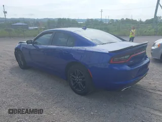 2019 Dodge Charger SXT with VIN 2C3CDXJG4KH550424, listed as a IAAI auction lot 40224159 with 56,988 mi miles and . Bid and sale history available at DreamBid. Image 3.