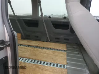 2013 Ford Econoline Passenger XL с VIN 1FBSS3BLXDDA73441, выставлен на аукционе Copart как лот 41402315 с пробегом 116 086 миль миль и Списание • Salvage title. История ставок и продаж доступна на DreamBid. Изображение 11.