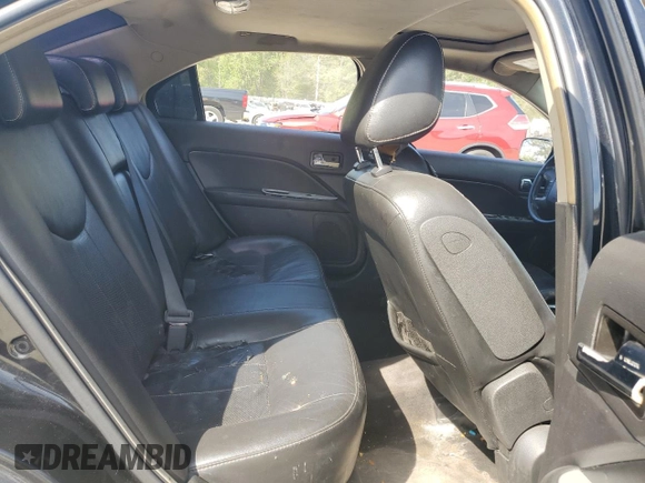 2010 Mercury Milan Premier z VIN 3MEHM0JA6AR624044, wystawiony jako Copart lot #54406895 z przebiegiem 197 486 mil mil oraz Szkoda całkowita • Salvage title. Historia ofert i sprzedaży dostępna na DreamBid. Obrazek 10.