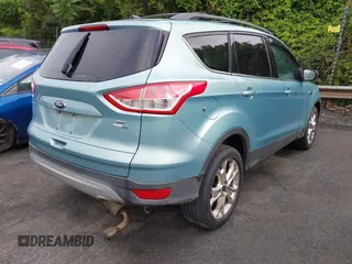 2013 Ford Escape SE with VIN 1FMCU9GX5DUD51120, listed as a IAAI auction lot 42196923 with 183,386 mi miles and . Bid and sale history available at DreamBid. Image 4.