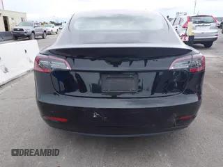 2022 Tesla Model 3 with VIN 5YJ3E1EA7NF314744, listed as a IAAI auction lot 42057596 with 30,936 mi miles and . Bid and sale history available at DreamBid. Image 16.