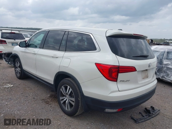 2018 Honda Pilot EX-L with VIN 5FNYF5H55JB016471, listed as a IAAI auction lot 42397519 with 102,482 mi miles and . Bid and sale history available at DreamBid. Image 3.