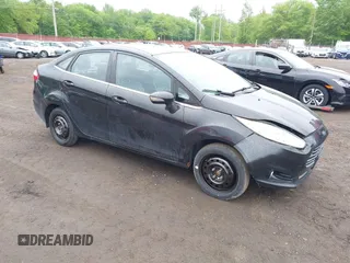 2014 Ford Fiesta Titanium z VIN 3FADP4CJ6EM117097, wystawiony jako IAAI lot #42260400 z przebiegiem 116 132 mil mil oraz . Historia ofert i sprzedaży dostępna na DreamBid. Obrazek 1.