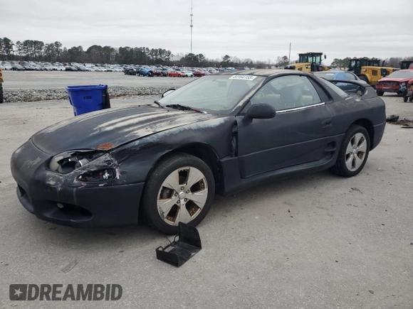 1998 Mitsubishi 3000GT z VIN JA3AM44H8WY000594, wystawiony jako Copart lot #44164155 z przebiegiem 92 227 mil mil oraz Czysty tytuł • Clean title. Historia ofert i sprzedaży dostępna na DreamBid. Obrazek 1.