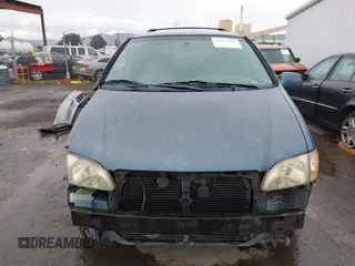 2001 Toyota Sienna LE with VIN 4T3ZF13C01U323995, listed as a IAAI auction lot 41472484 with 232,667 mi miles. Bid and sale history available at carsss.com. Image 13.