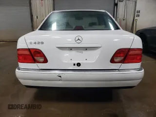 1997 Mercedes-Benz E-Class with VIN WDBJF72F6VA263199, listed as a Copart auction lot 43445715 with 121,444 mi miles and Salvage Title. Bid and sale history available at carsss.com. Image 6.