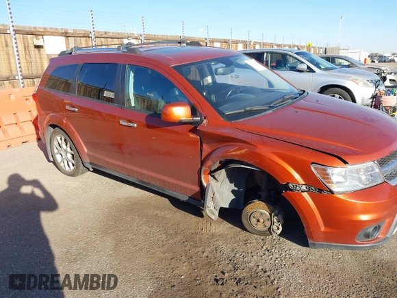 2014 Dodge Journey R/T with VIN 3C4PDDFG4ET104127, listed as a IAAI auction lot 40702930 with 87,058 mi miles and . Bid and sale history available at DreamBid. Image 1.