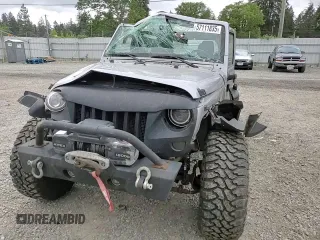 2013 Jeep Wrangler Unlimited Sport с VIN 1C4BJWDG1DL635698, выставлен на аукционе Copart как лот 57111835 с пробегом 185 759 миль миль и Списание • Salvage title. История ставок и продаж доступна на DreamBid. Изображение 14.