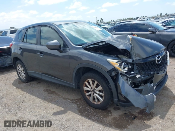 2014 Mazda CX-5 Sport with VIN JM3KE2BE0E0411377, listed as a IAAI auction lot 42143229 with 137,384 mi miles and . Bid and sale history available at carsss.com. Image 1.