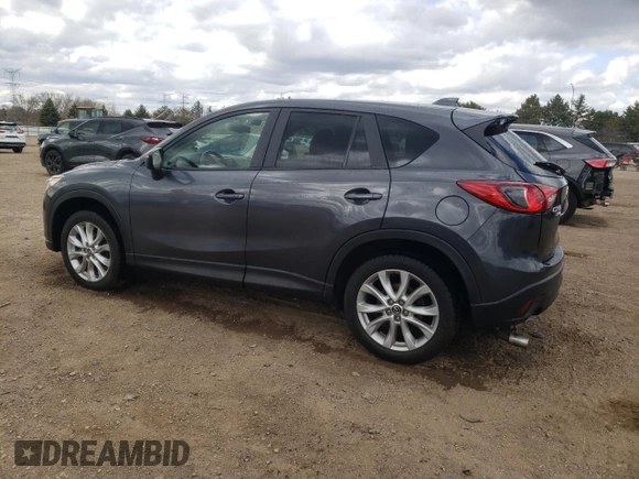 2015 Mazda CX-5 Grand Touring with VIN JM3KE4DY2F0526535, listed as a Copart auction lot 53046855 with 90,288 mi miles and Salvage Title. Bid and sale history available at DreamBid. Image 2.
