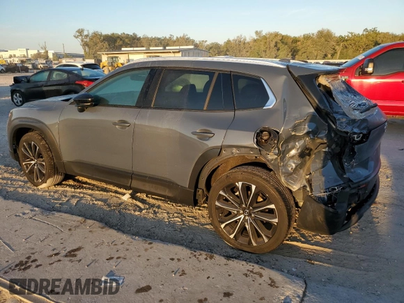 2023 Mazda CX-50 S Premium Plus with VIN 7MMVABEM3PN102285, listed as a Copart auction lot 77684064 with 14,190 mi miles and Salvage Title. Bid and sale history available at DreamBid. Image 2.