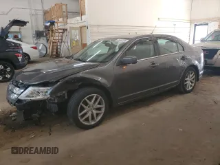 2012 Ford Fusion SEL z VIN 3FAHP0JA7CR134570, wystawiony jako Copart lot #60485255 z przebiegiem 226 830 mil mil oraz Szkoda całkowita • Salvage title. Historia ofert i sprzedaży dostępna na DreamBid. Obrazek 1.