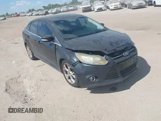 2014 Ford Focus Titanium with VIN 1FADP3J22EL460884, listed as a IAAI auction lot 42833959 with 144,607 mi miles and . Bid and sale history available at DreamBid. Image 1.