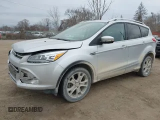 2015 Ford Escape Titanium with VIN 1FMCU9J92FUA60166, listed as a IAAI auction lot 41914080 with 103,122 mi miles and . Bid and sale history available at DreamBid. Image 2.