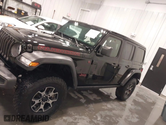 2019 Jeep Wrangler Unlimited Rubicon z VIN 1C4HJXFN7KW561193, wystawiony jako IAAI lot #41500907 z przebiegiem 18 697 mil mil oraz . Historia ofert i sprzedaży dostępna na DreamBid. Obrazek 15.