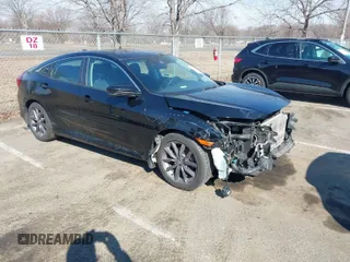 2021 Honda Civic Sedan EX with VIN 19XFC1F32ME206507, listed as a IAAI auction lot 41649684 with 145,491 mi miles. Bid and sale history available at carsss.com. Image 1.