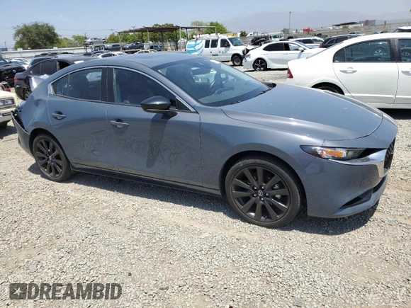 2022 Mazda 3 Carbon Edition with VIN JM1BPACL6N1507664, listed as a Copart auction lot 57847125 with 34,258 mi miles and Salvage title. Bid and sale history available at DreamBid. Image 4.