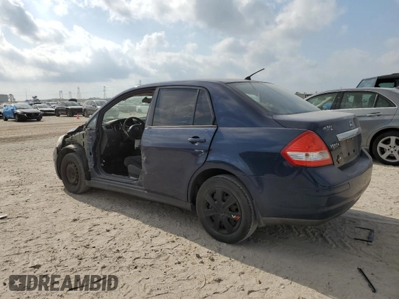 2010 Nissan Versa S with VIN 3N1BC1AP9AL425600, listed as a Copart auction lot 53688305 with 203,371 mi miles and Salvage title. Bid and sale history available at DreamBid. Image 2.