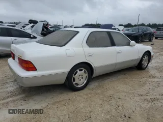 2000 Lexus LS 400 z VIN JT8BH28FXY0178613, wystawiony jako Copart lot #74883444 z przebiegiem Nie podano mil oraz Szkody całkowita. Historia ofert i sprzedaży dostępna na DreamBid. Obrazek 3.