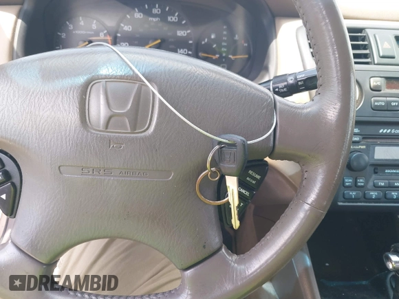2002 Honda Accord EX z VIN 1HGCG16502A014058, wystawiony jako IAAI lot #42030847 z przebiegiem 160 708 mil mil oraz . Historia ofert i sprzedaży dostępna na DreamBid. Obrazek 11.