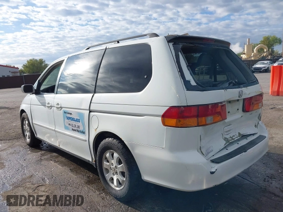 2004 Honda Odyssey EX-L with VIN 5FNRL18074B109717, listed as a IAAI auction lot 37731273 with 314,449 mi miles and . Bid and sale history available at DreamBid. Image 3.