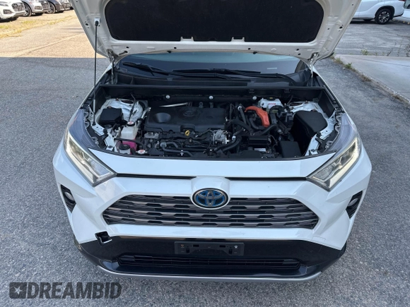 2019 Toyota RAV4 Hybrid XSE with VIN JTMEWRFV5KJ004893, listed as a IAAI auction lot 42772122 with 168,511 mi miles and . Bid and sale history available at DreamBid. Image 10.