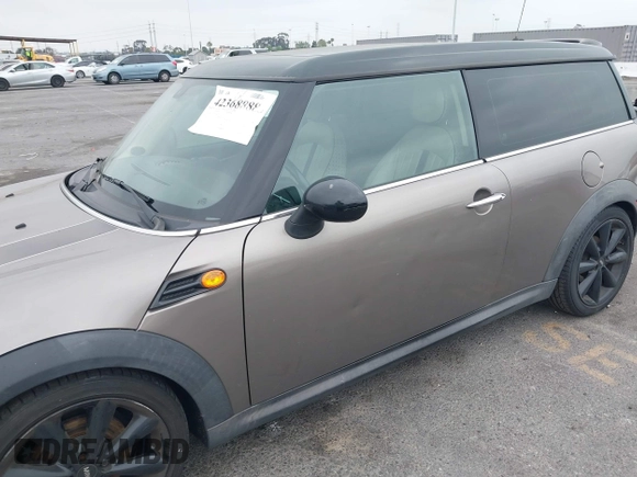 2013 MINI Clubman z VIN WMWZF3C56DT490749, wystawiony jako IAAI lot #42368888 z przebiegiem 163 731 mil mil oraz . Historia ofert i sprzedaży dostępna na DreamBid. Obrazek 6.