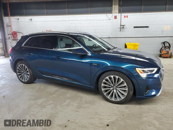 2019 Audi e-tron Prestige with VIN WA1VABGE2KB010143, listed as a Copart auction lot 52039045 with 62,991 mi miles and Salvage Title. Bid and sale history available at DreamBid. Image 4.