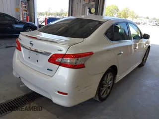 2013 Nissan Sentra S with VIN 3N1AB7AP9DL704552, listed as a IAAI auction lot 40259803 with 158,829 mi miles and . Bid and sale history available at DreamBid. Image 4.