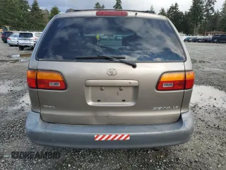 1999 Toyota Sienna LE with VIN 4T3ZF13C0XU133039, listed as a Copart auction lot 51162645 with 182,318 mi miles and Salvage Title. Bid and sale history available at carsss.com. Image 6.
