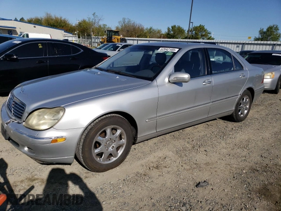 2002 Mercedes-Benz S-Class 5.0L with VIN WDBNG75JX2A306811, listed as a Copart auction lot 52042105 with 206,531 mi miles and Salvage Title. Bid and sale history available at carsss.com. Image 1.