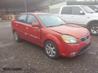 2011 Kia Rio LX with VIN KNADH4A33B6714471, listed as a IAAI auction lot 41970737 with 188,214 mi miles. Bid and sale history available at carsss.com. Image 1.