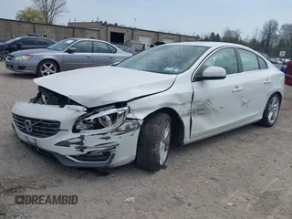 2014 Volvo S60 T5 z VIN YV1612FH8E1292976, wystawiony jako IAAI lot #42129708 z przebiegiem 162 083 mil mil oraz . Historia ofert i sprzedaży dostępna na DreamBid. Obrazek 18.