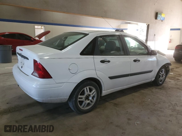 2003 Ford Focus LX with VIN 1FAFP33P43W201570, listed as a Copart auction lot 43130555 with 222,727 mi miles and Salvage Title. Bid and sale history available at carsss.com. Image 3.