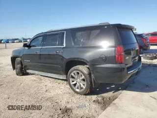 2019 Chevrolet Suburban LT with VIN 1GNSCJKCXKR408508, listed as a Copart auction lot 50618465 with 79,258 mi miles and Salvage Title. Bid and sale history available at carsss.com. Image 2.