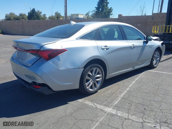 2019 Toyota Avalon Hybrid Limited with VIN 4T1B21FB1KU003112, listed as a IAAI auction lot 41610307 with 169,569 mi miles. Bid and sale history available at carsss.com. Image 4.