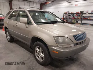 1999 Lexus RX 300 Luxury SUV with VIN JT6HF10U1X0013464, listed as a IAAI auction lot 42088616 with 254,653 mi miles. Bid and sale history available at carsss.com. Image 1.
