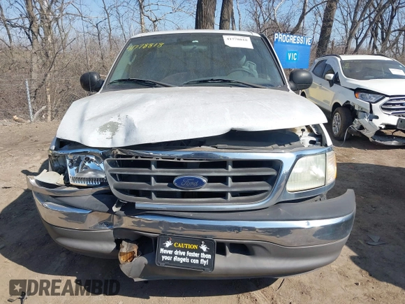 2003 Ford F-150 with VIN 2FTRX17L63CA31923, listed as a IAAI auction lot 41778818 with 107,600 mi miles and . Bid and sale history available at DreamBid. Image 12.