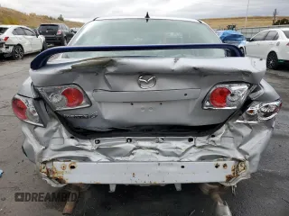2006 Mazda 6 i with VIN 1YVFP80CX65M55409, listed as a Copart auction lot 76844234 with 143,238 mi miles and Salvage Title. Bid and sale history available at carsss.com. Image 6.
