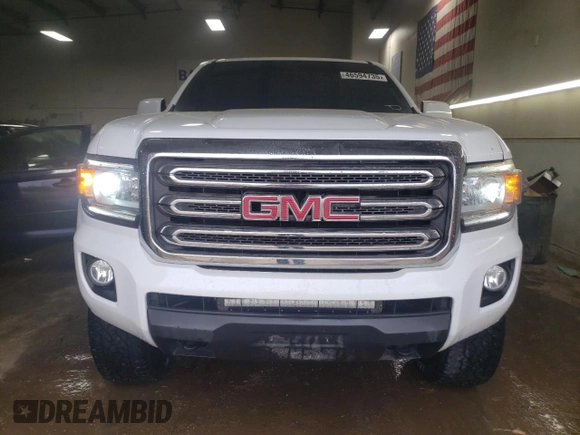 2015 GMC Canyon 4WD SLE with VIN 1GTG6BE36F1187064, listed as a Copart auction lot 46594735 with 109,987 mi miles and Salvage Title. Bid and sale history available at carsss.com. Image 5.